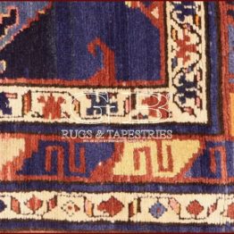 alfombra kazak antiguo
