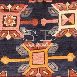 alfombra kazak antiguo