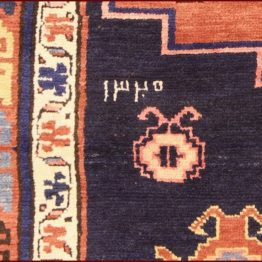 alfombra kazak antiguo