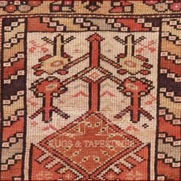 alfombra melas antiguo